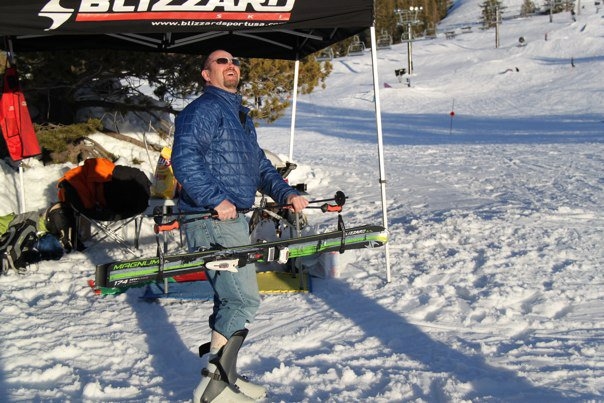 Not actually a convenient way to transport skis. As they will slip out of the pole straps on the reg